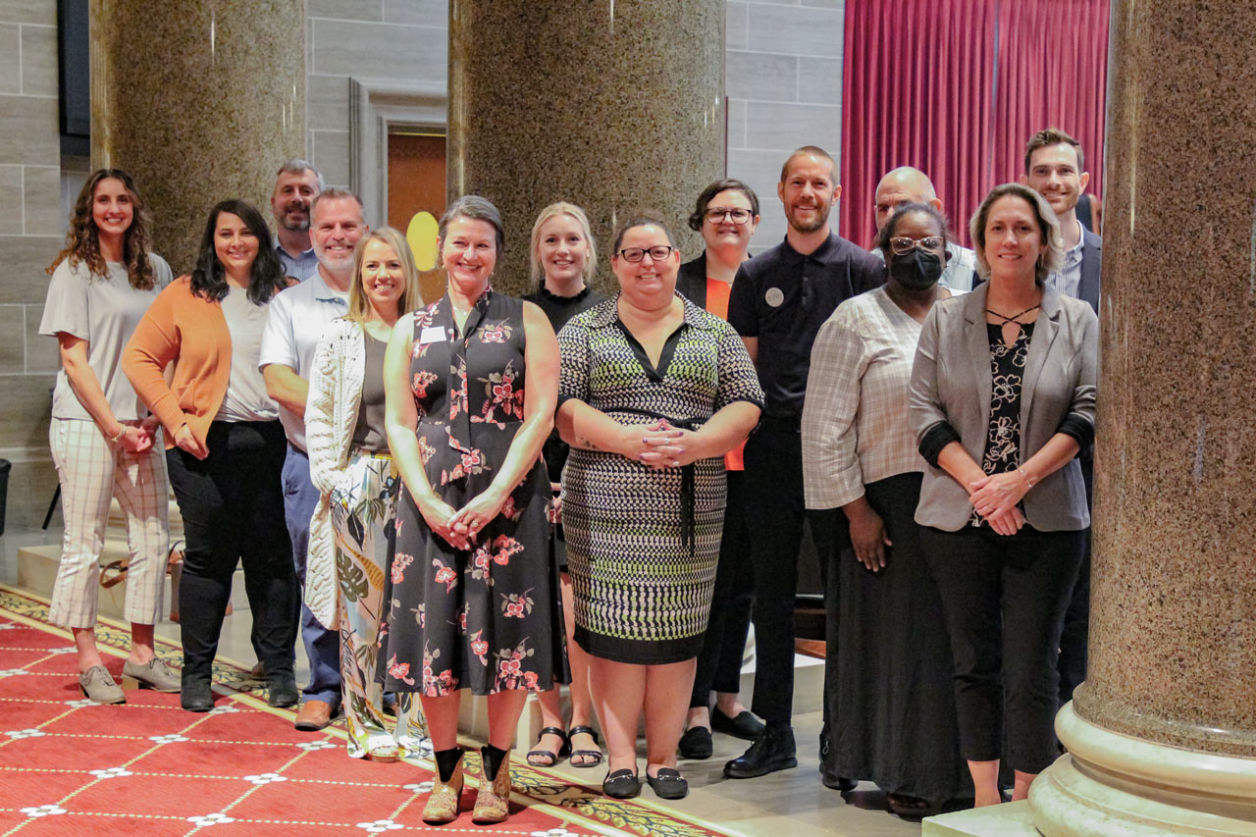 Group photo of Jennifer Carter Dochler with the Introductory Capital Workshop attendees during a tour of the Missouri State Capitol (Sept. 2023).