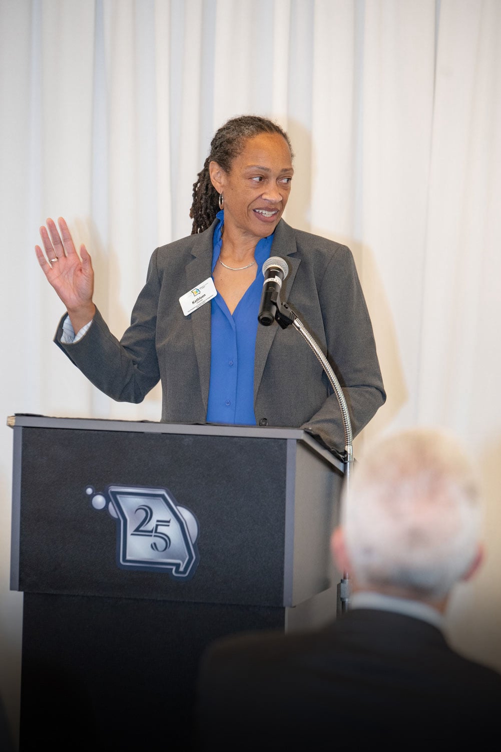 Kathleen Holmes at podium