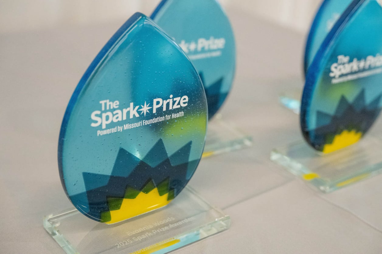 Spark prize awards on table