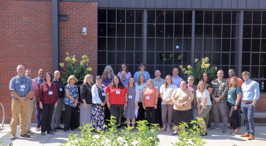 Missouri Firearm Suicide Prevention Learning Cohort standing in front of MFH headquarters