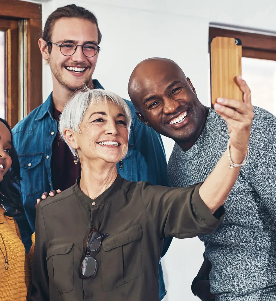 Group of people taking a selfie