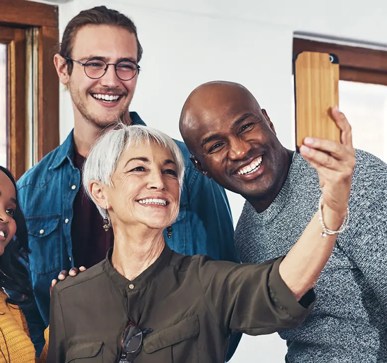 Group of people taking a selfie