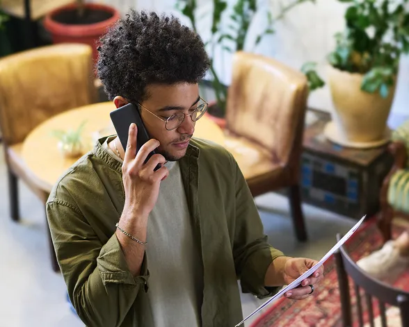 Yong man is talking on the phone