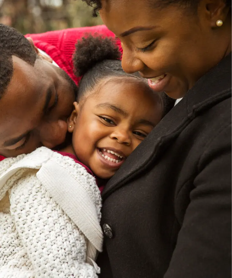 A family of black youth with a child