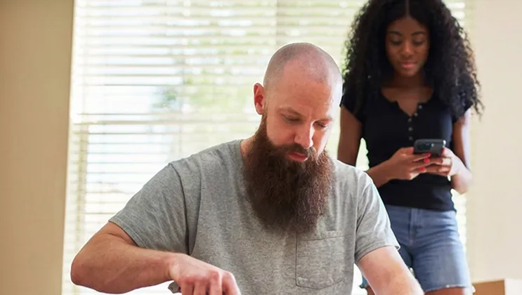 A couple moving into a new home