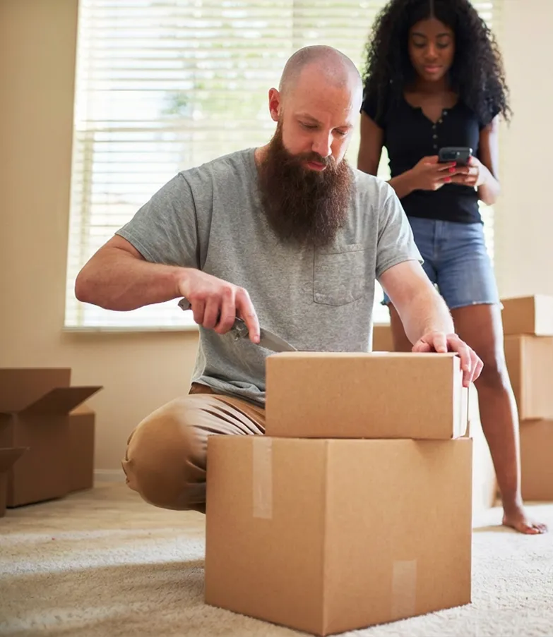 A couple moving into a new home