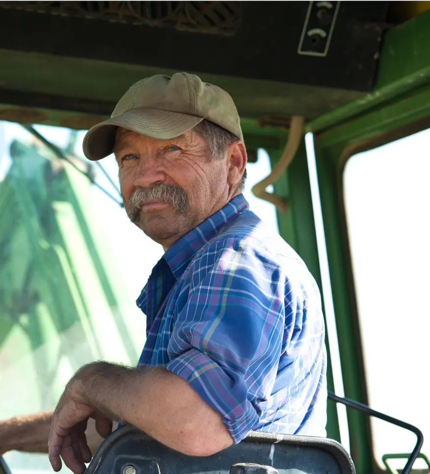 A farmer in his tractor