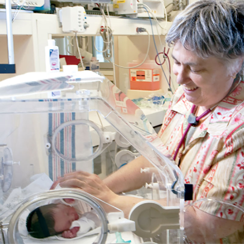 image of Dr Walentik treating infant