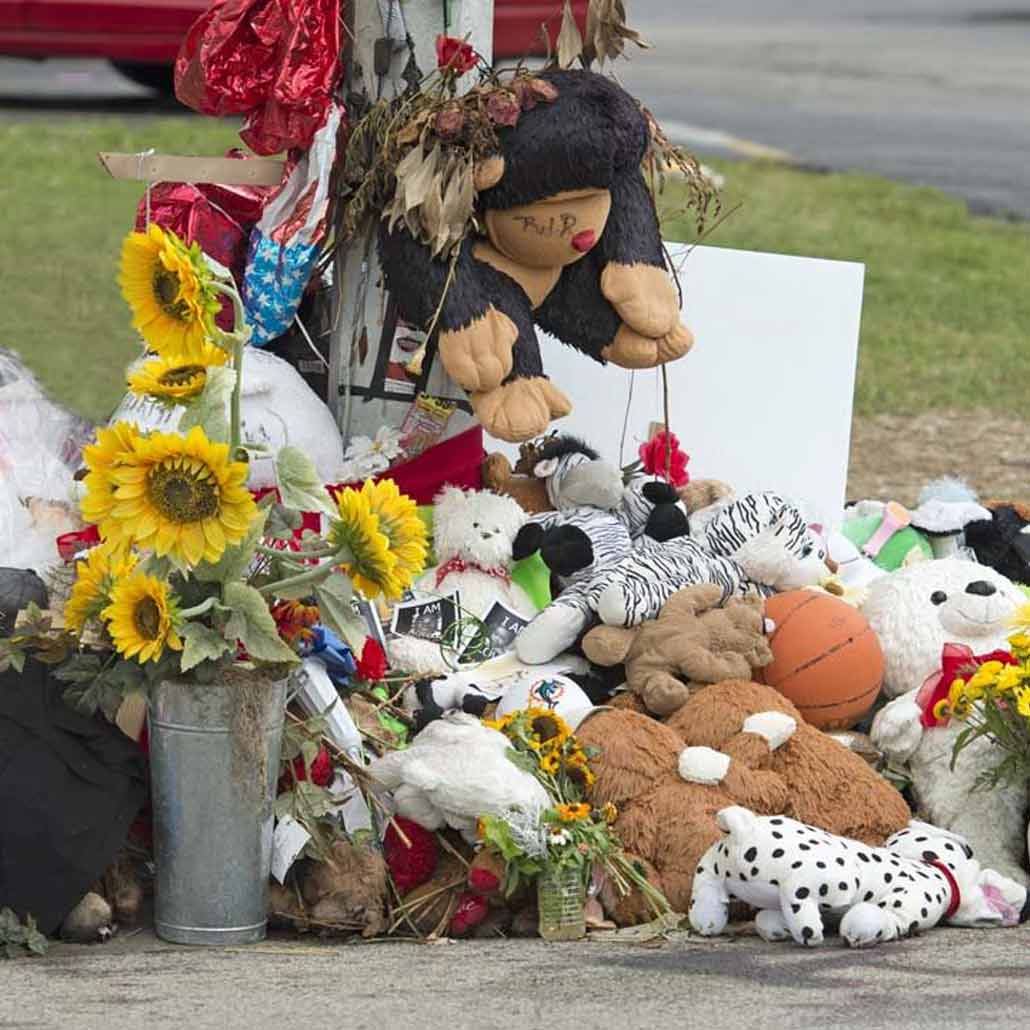 photo of street memorial following shooting death