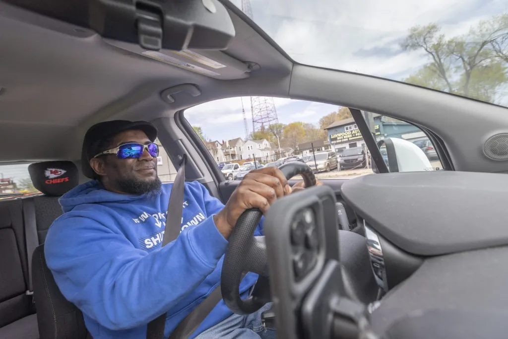 Terrence Wise currently works as a driver with Uber, DoorDash and Instacart. He’s seen his base wage as a gig worker tick up from $2.50 to $4 since Prop A passed last fall. Credit: Jeff Tuttle