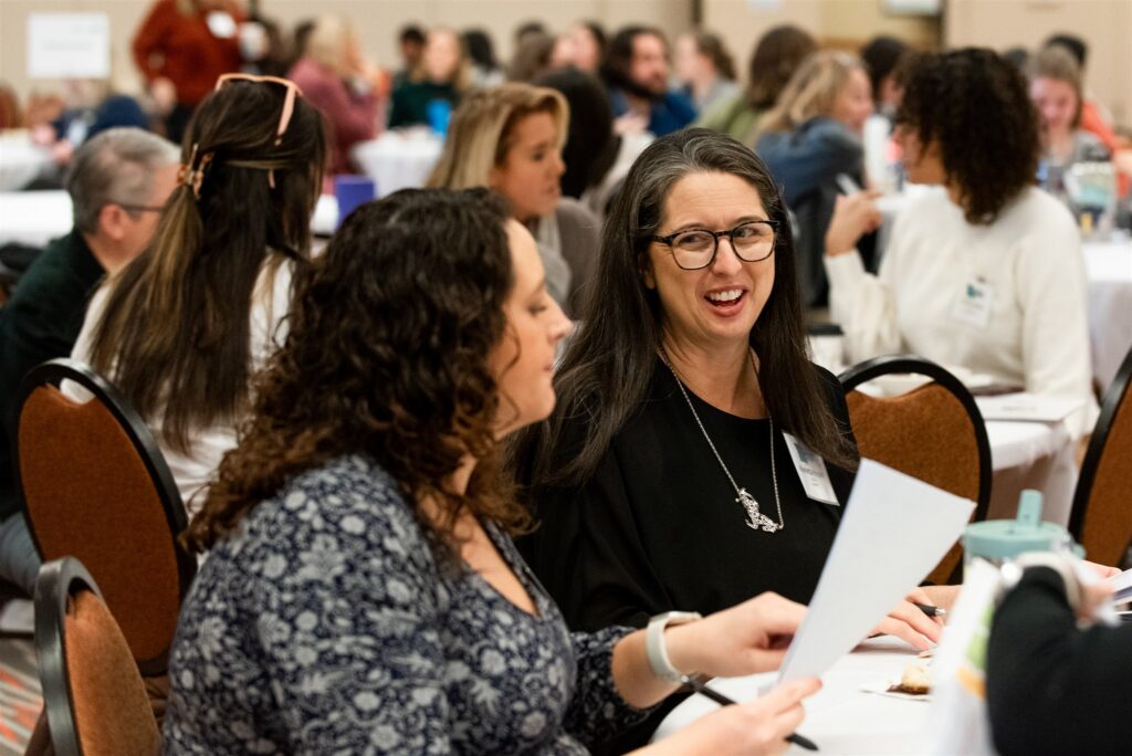 A diverse crowd participates in the Advocates’ Retreat