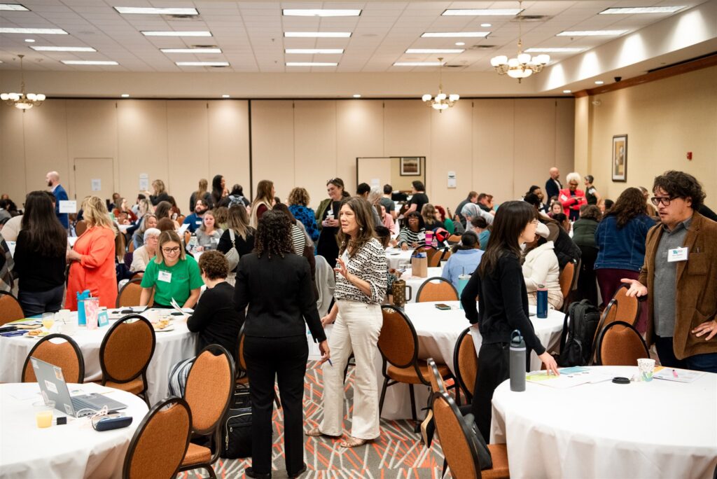 A diverse crowd participates in the Advocates’ Retreat